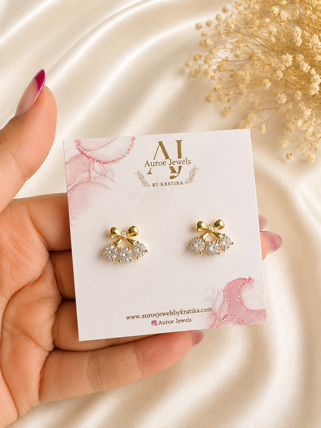 Crystal Bow Charm Studs.